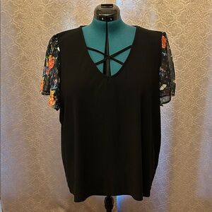 Elegant Black Blouse with Floral Accents